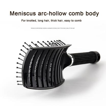 Curved hair comb with black bristles and textured grip handle