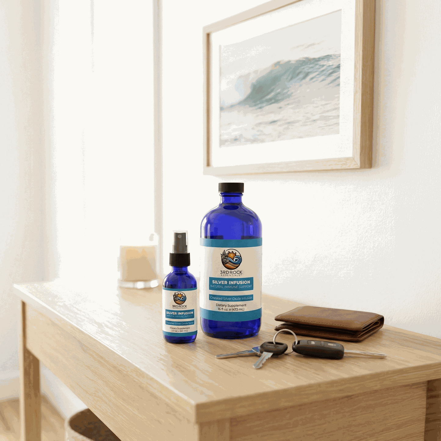 Silver infusion supplement bottle with small dropper bottle on a wooden shelf