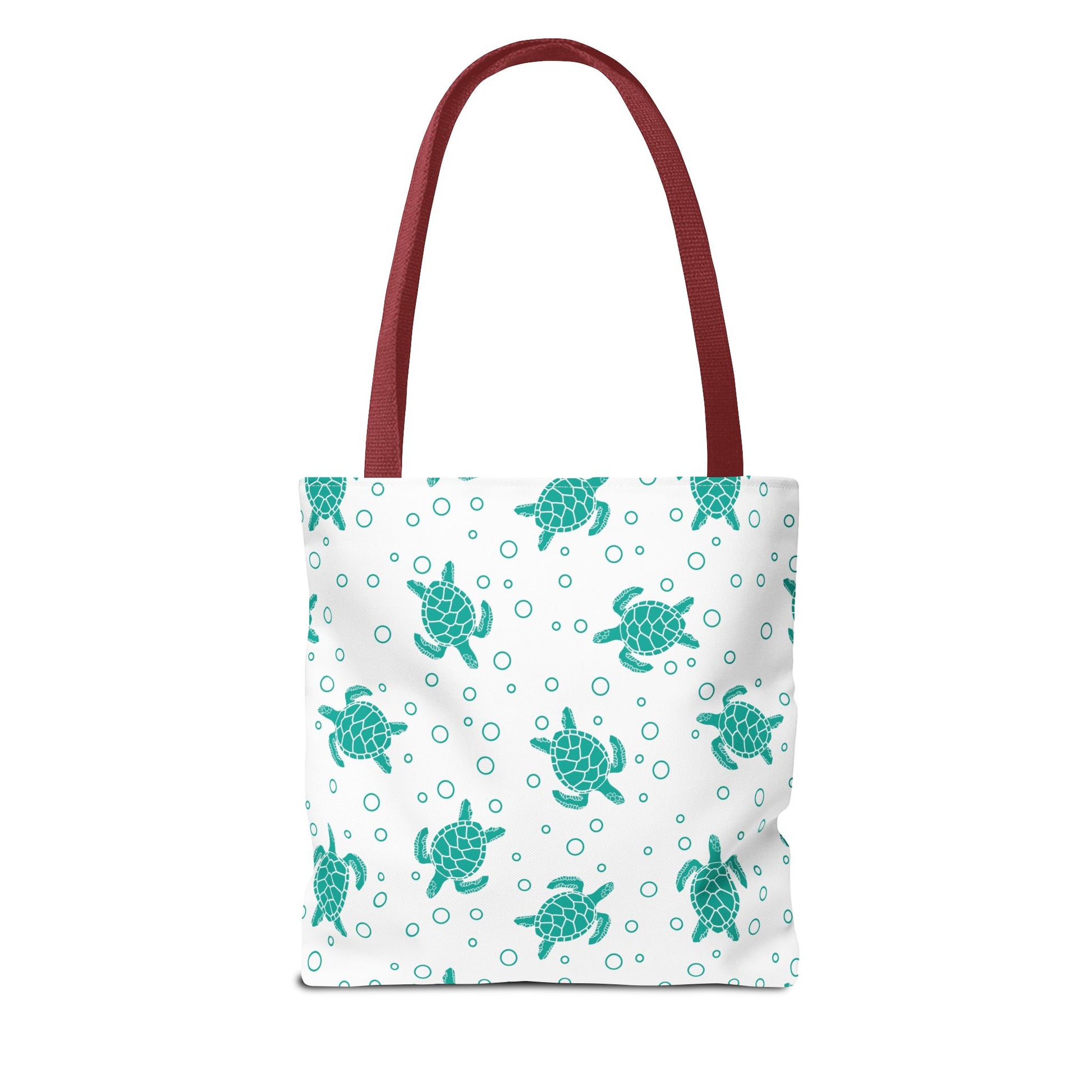Sea turtle pattern tote bag with teal repeating turtles and red carry handles