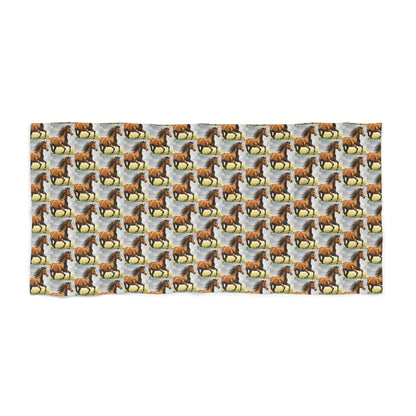 Horse-pattern beach towel with repeating brown-and-white horses on light blue
