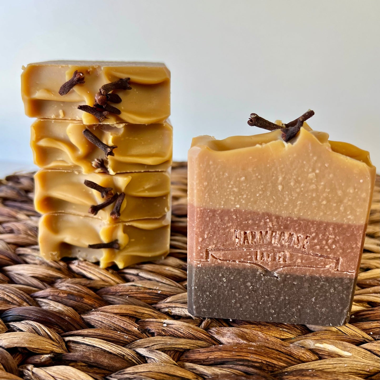 Bourbon Barrel soap bar, warm amber top and dark brown base, clove accents