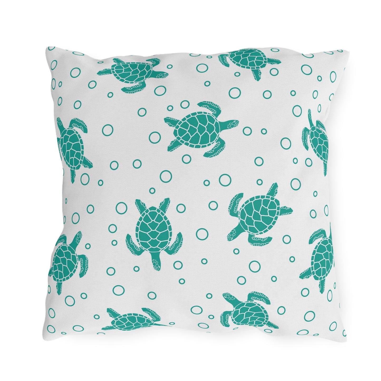 Outdoor sea turtle pillow with teal turtles and dot pattern on white background