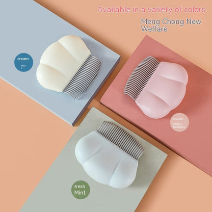 Pet shell grooming combs in cream, mint, and pink colors with metal teeth