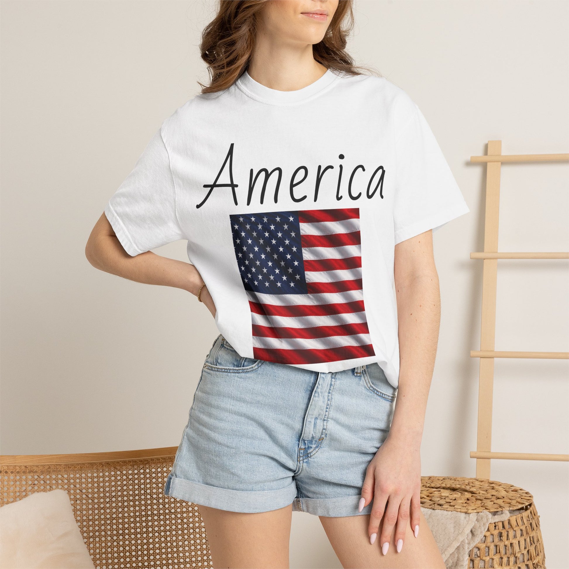White unisex t-shirt with “America” script and U.S. flag rectangle graphic