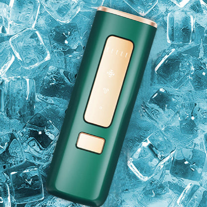 Dark green handheld laser hair remover with gold control window and power button