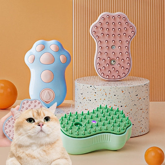 Electric pet massage comb with blue paw body and green bristle base; pink comb included