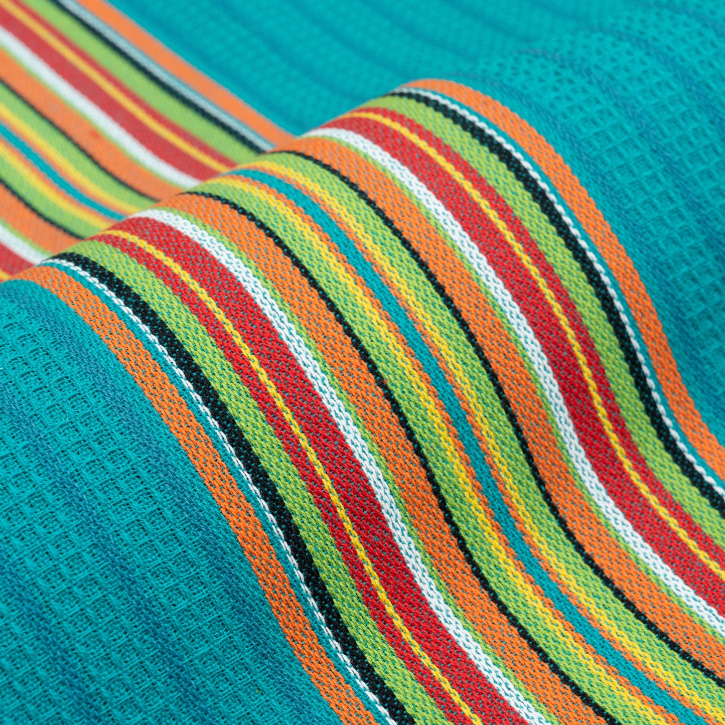 Striped kitchen towel fabric close-up in teal, green, and orange with white and red stripes