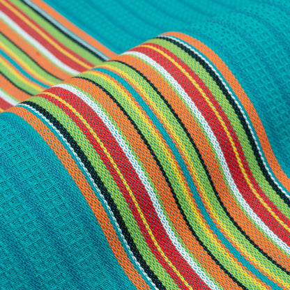 Striped kitchen towel fabric close-up in teal, green, and orange with white and red stripes