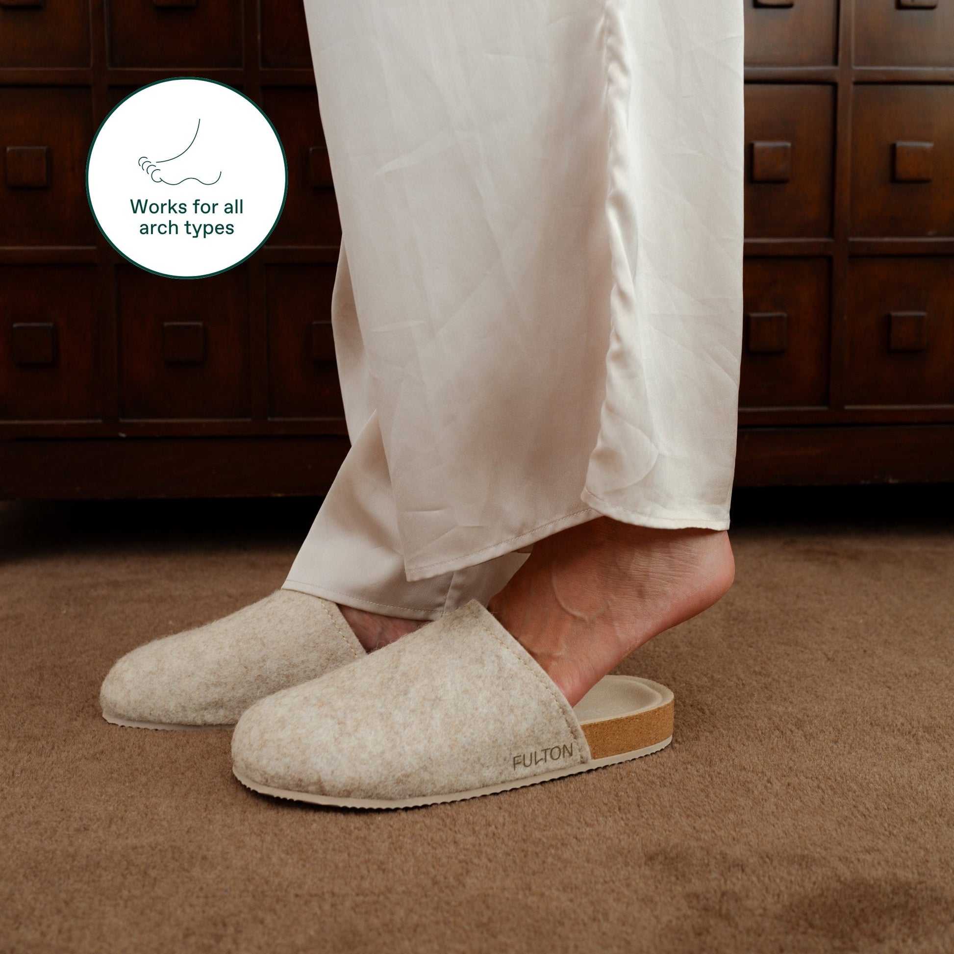 Light beige house shoe with tan outsole and slip-on comfort fit