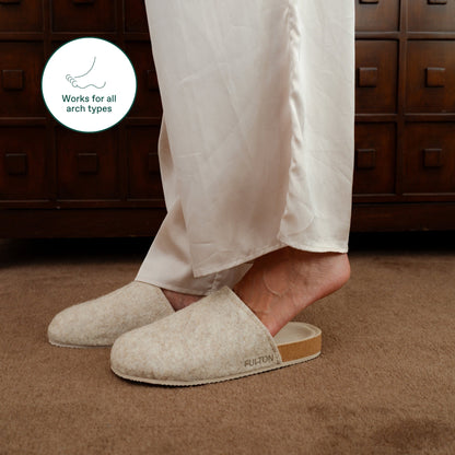 Light beige house shoe with tan outsole and slip-on comfort fit