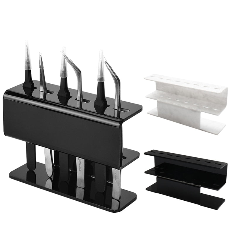 Black acrylic eyelash tweezer holder with two-tier stand and cutout slots