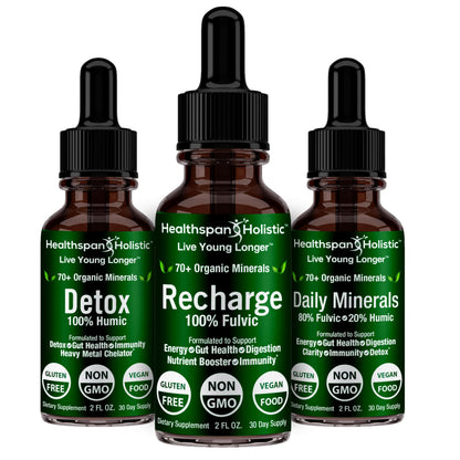 Herbal supplement bottles with black droppers: Detox, Recharge, Daily Minerals, 70+ minerals