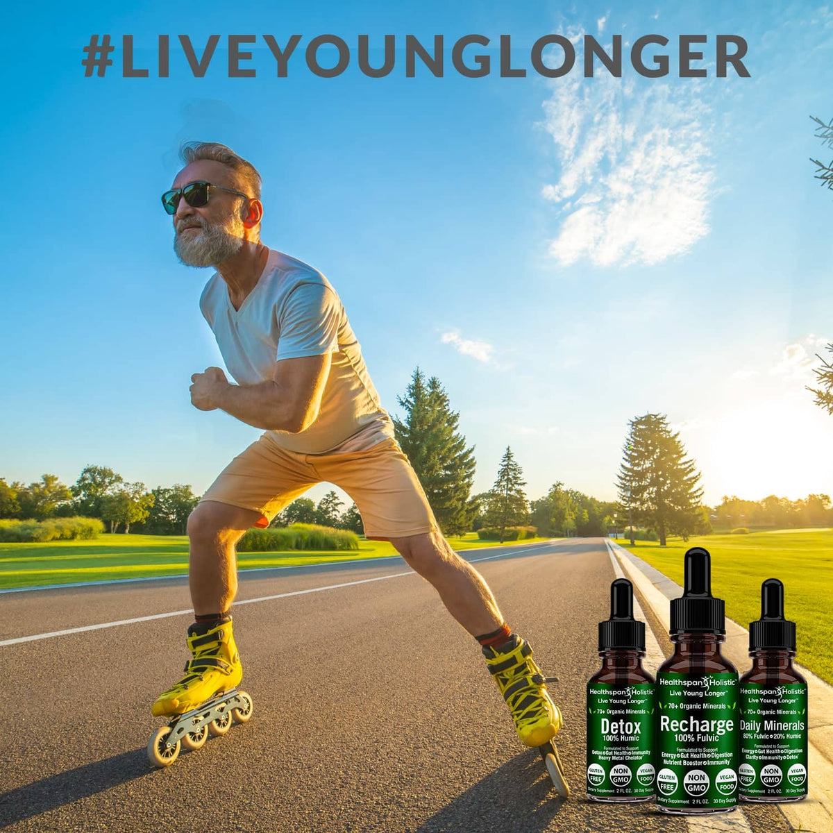 Three herbal supplement bottles with black droppers in the foreground