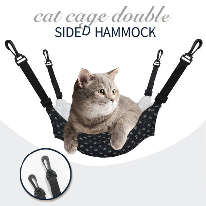 Cat hammock with dark fabric and white star pattern, suspended by black straps