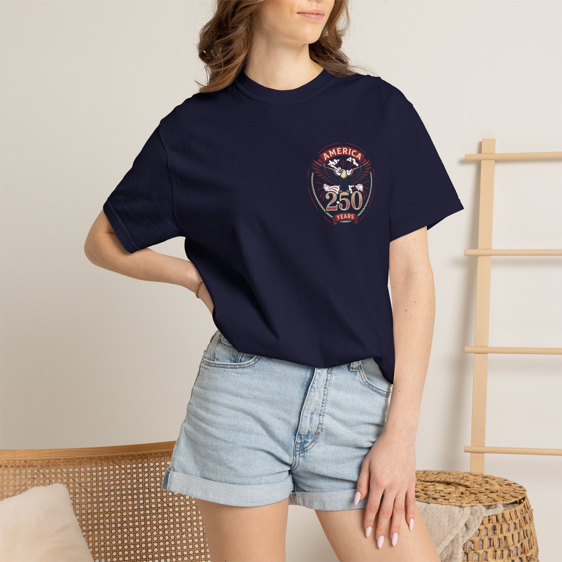 Navy T-shirt with America 250 Years eagle emblem, worn by model