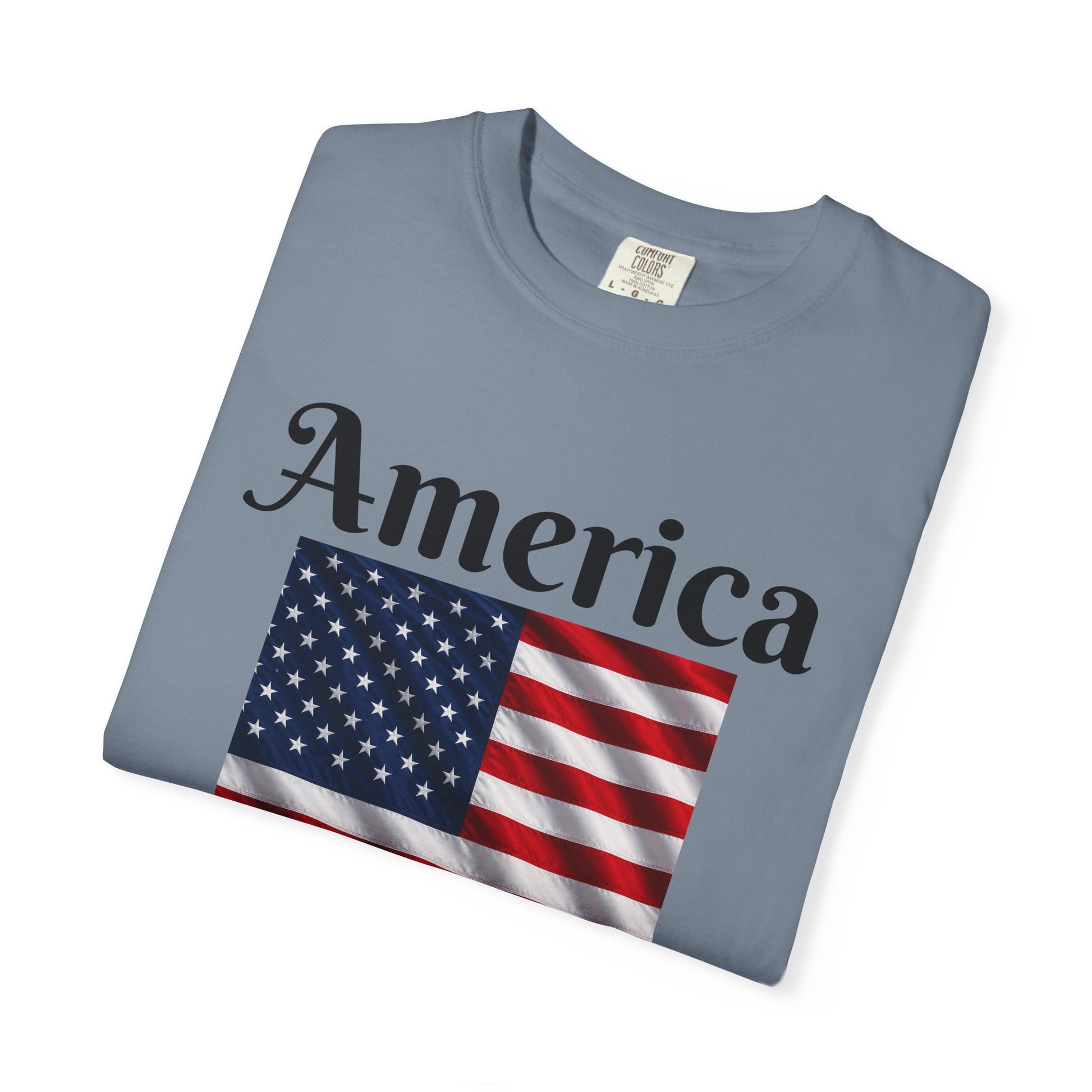 Blue T-shirt with America flag square graphic and 'America' text across the chest