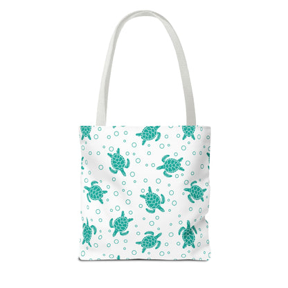 Tote bag with repeating teal sea turtle pattern and white carrying handles