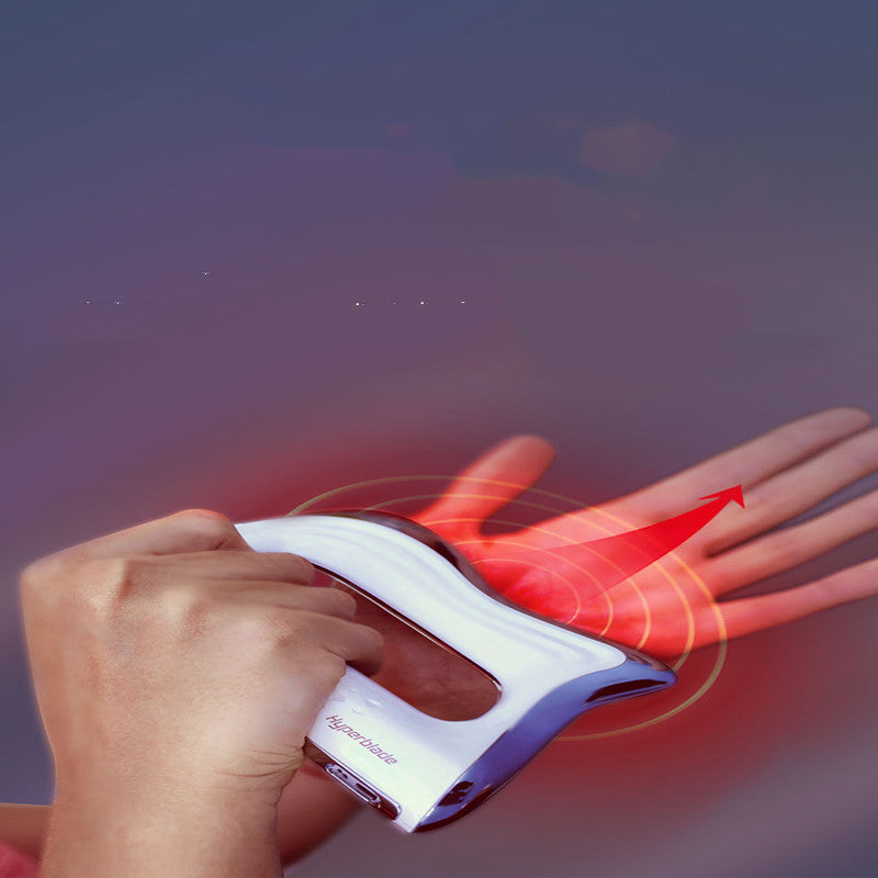Hand holding white electric fascia knife massager with red treatment glow