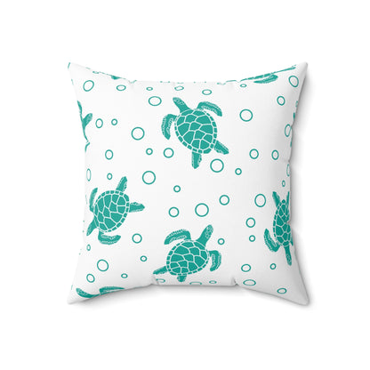 Square decorative pillow, teal sea turtle and ring pattern on white fabric