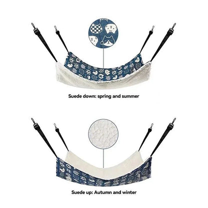 Cotton pet hammock with blue animal-print fabric, white fleece underside, black straps
