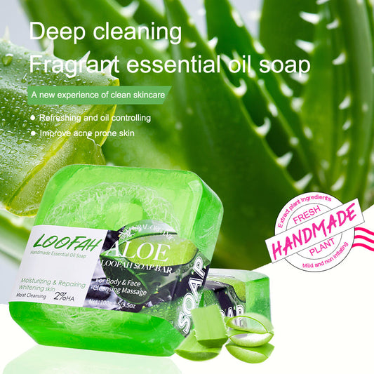 Green aloe loofah essential oil soap bar with printed label and small aloe leaves
