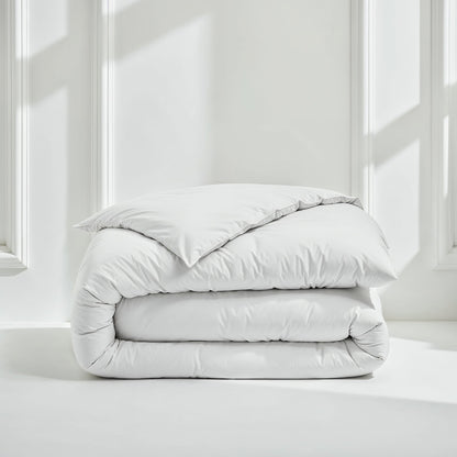 White sateen bedding bundle with a folded duvet and two pillows