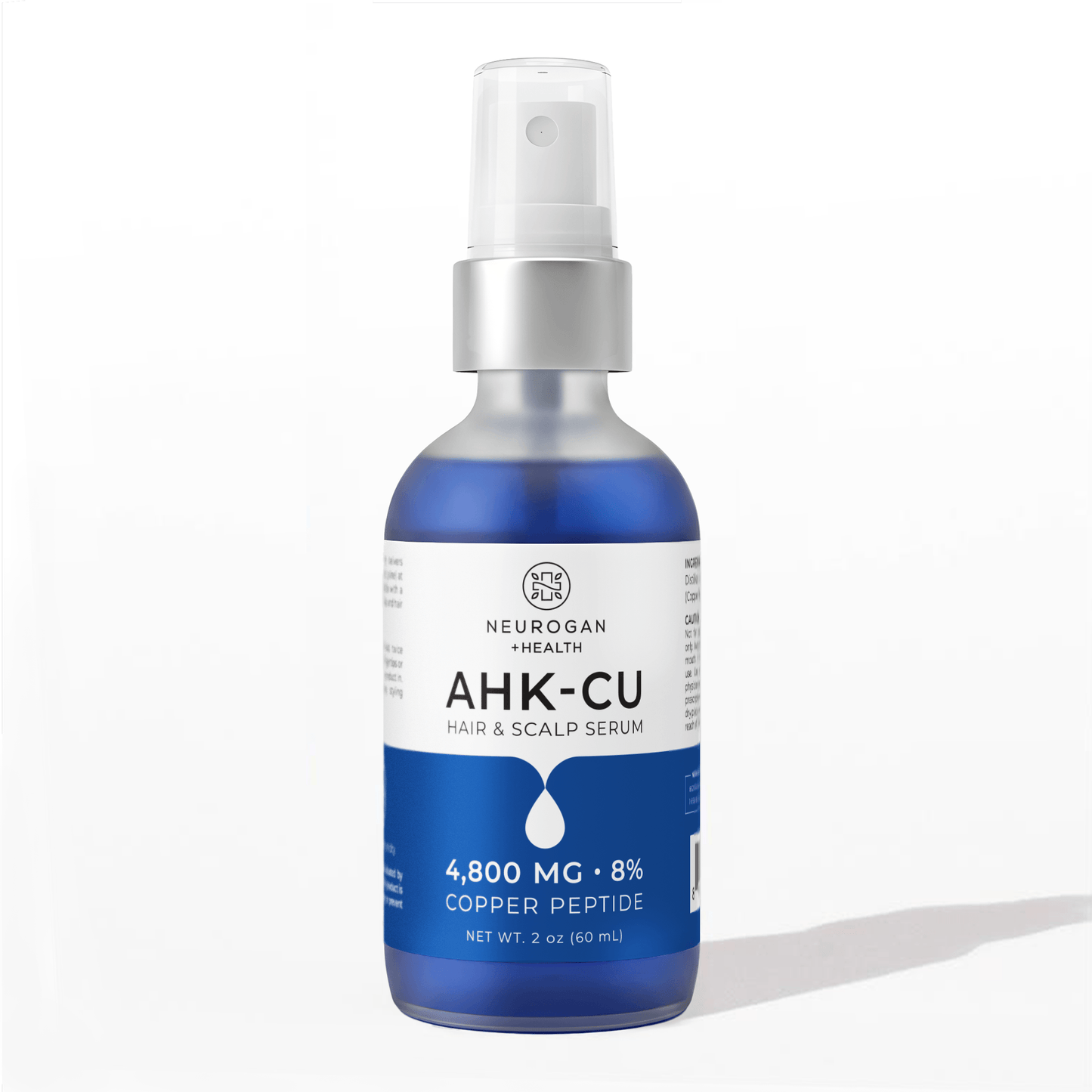 AHK-Cu hair & scalp serum bottle with blue liquid and white spray pump.