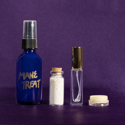 Blue Mane Treat spray bottle, powder vial, clear mist bottle, and cream jar set