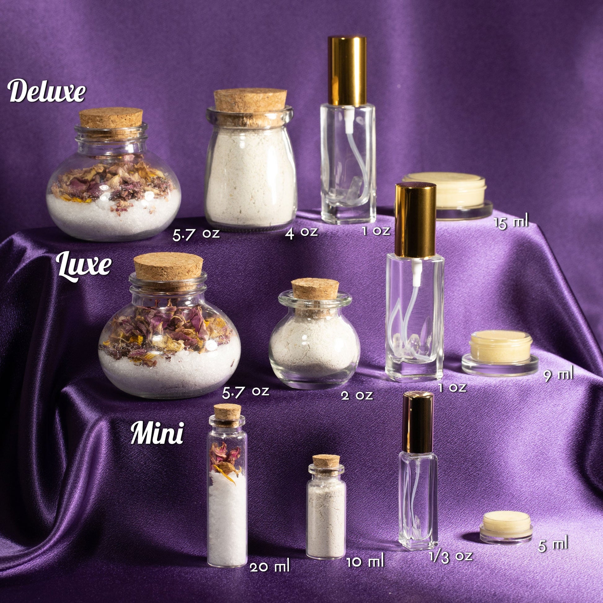 Spa gift set lineup: mini and deluxe glass bottles, salt jars, and cream jar in sizes
