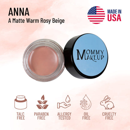 Warm rosy beige cream-to-powder in clear jar with round blue lid, matte finish