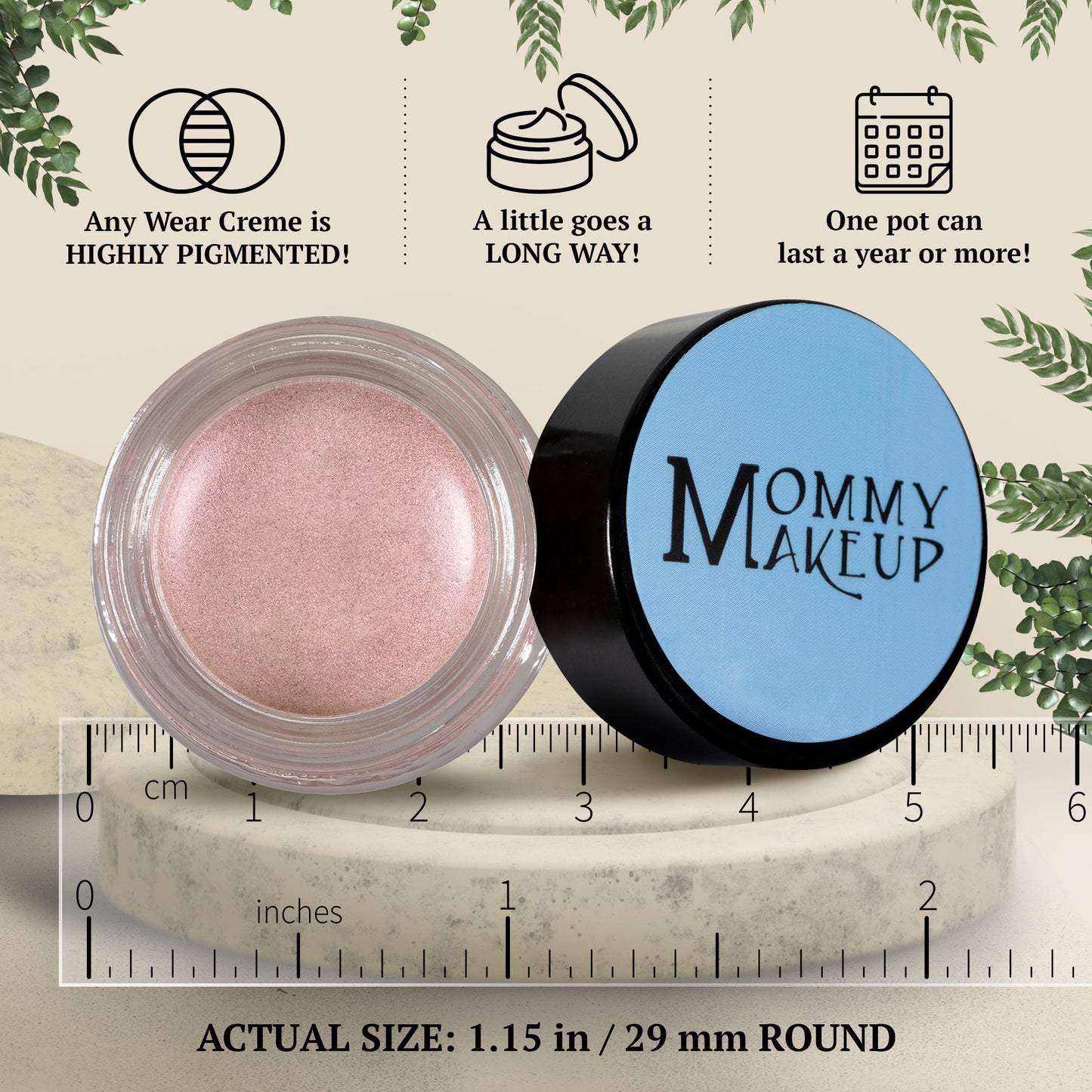 Pearl pink shimmer cream in round clear jar with blue-lidded container and ruler