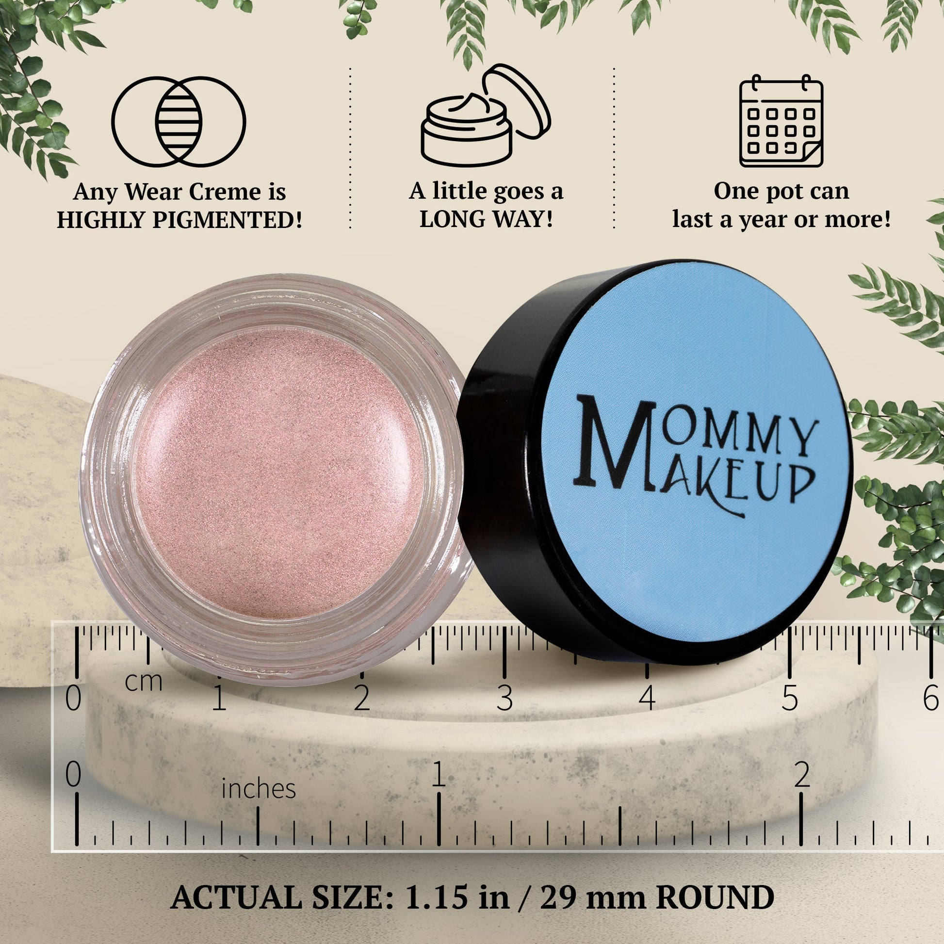 Pearl pink shimmer cream in round clear jar with blue-lidded container and ruler