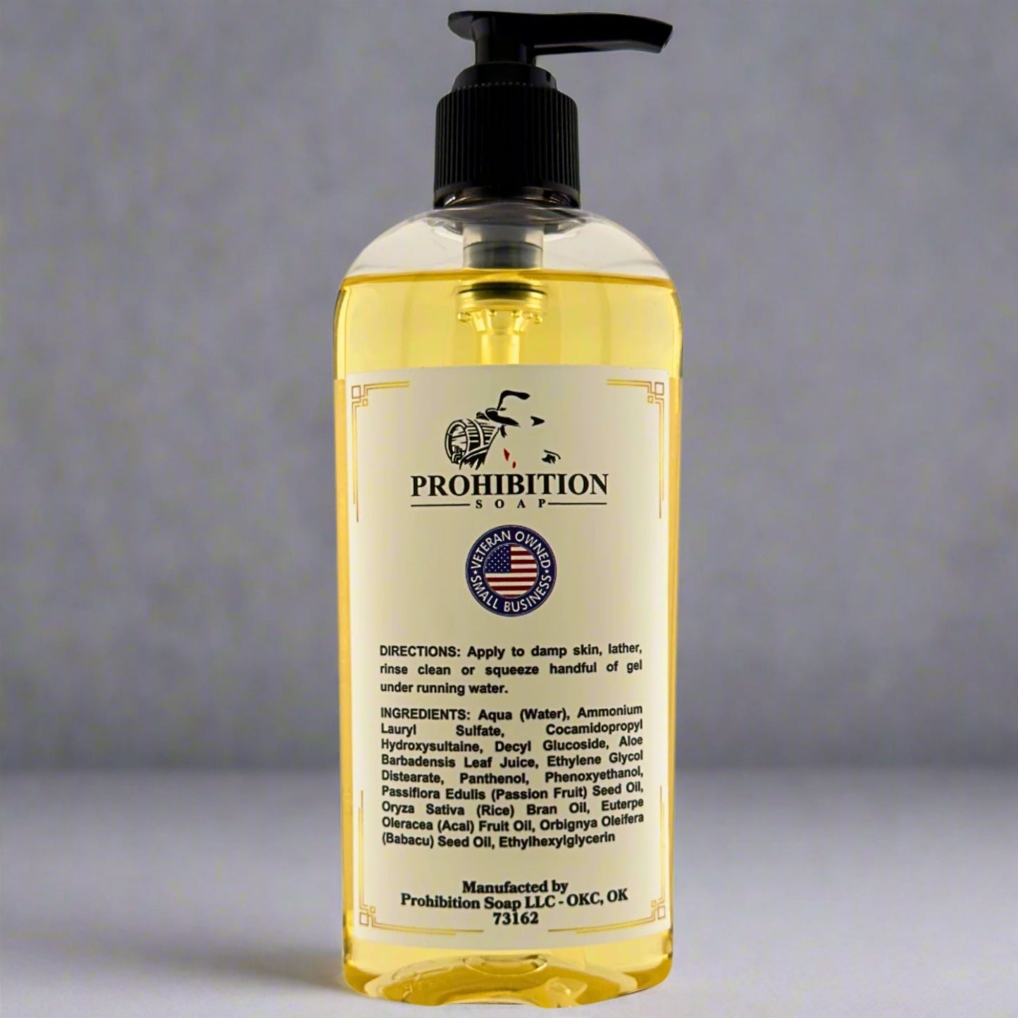 Liquid hand soap bottle with black pump and back label, clear yellow gel