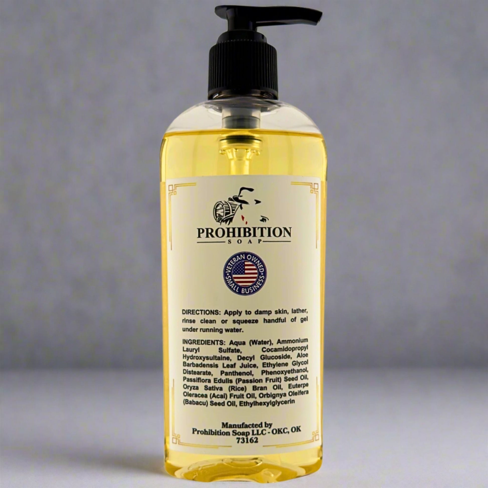 Liquid hand soap bottle with black pump and back label, clear yellow gel