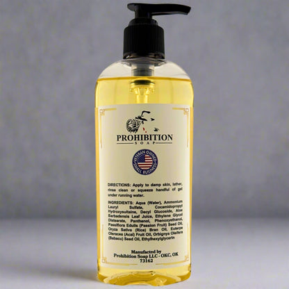 Liquid hand soap bottle with black pump and back label, clear yellow gel