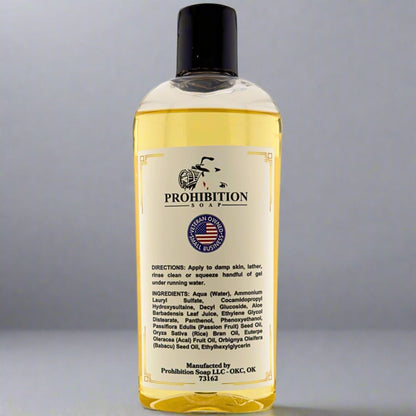 Shampoo bottle with black cap and back label with directions and ingredients
