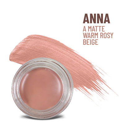 Warm rosy beige cream-to-powder in clear round jar with open lid, matte finish