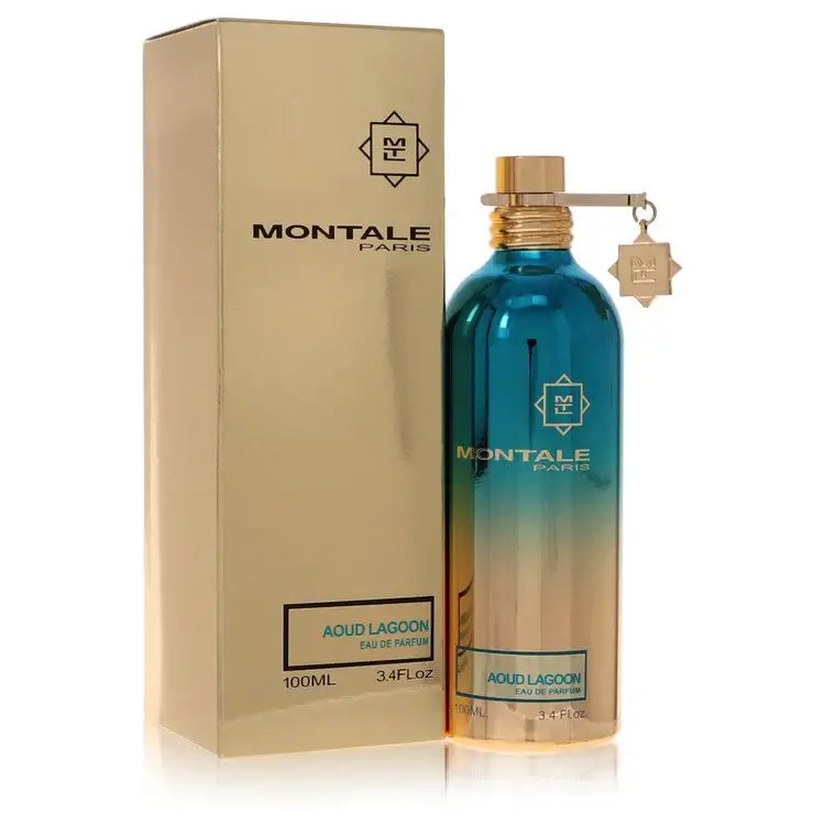 Unisex eau de parfum bottle with gold cap, teal glass, and beige box with hanging tag