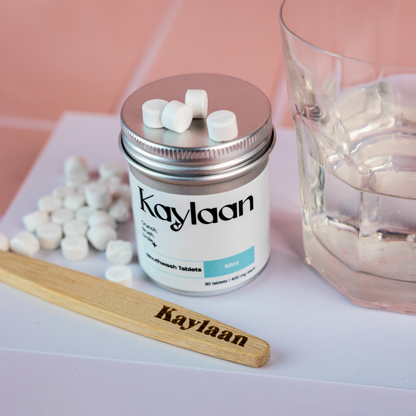 Mouthwash tablets jar with mint tablets and Kaylaan wooden scoop