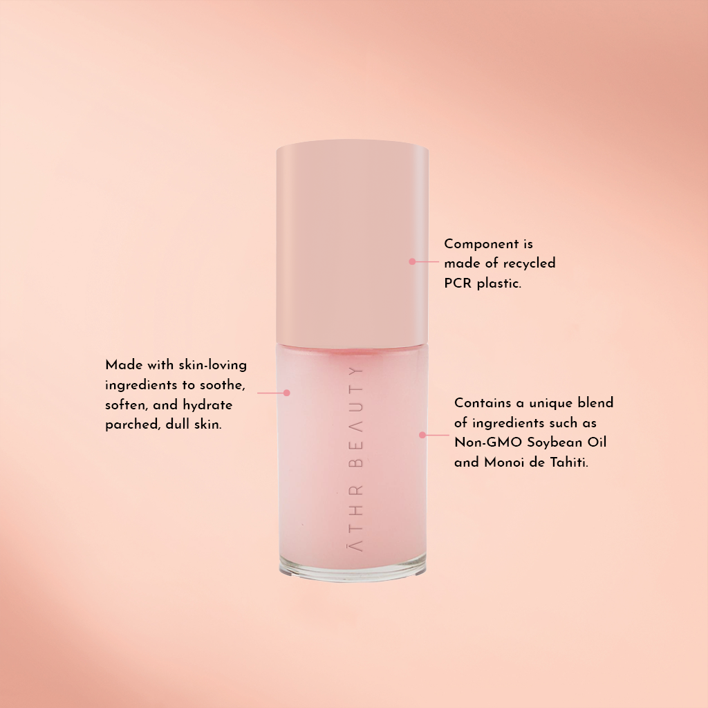 Aurora Glow lip oil bottle with light-pink label and printed directions on side