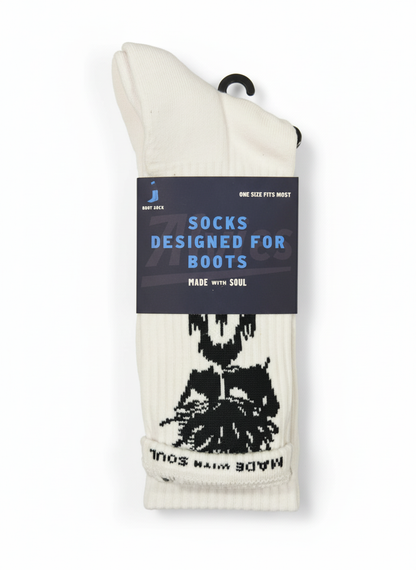 Packaged white boot socks with black tree graphic, ribbed crew knit.