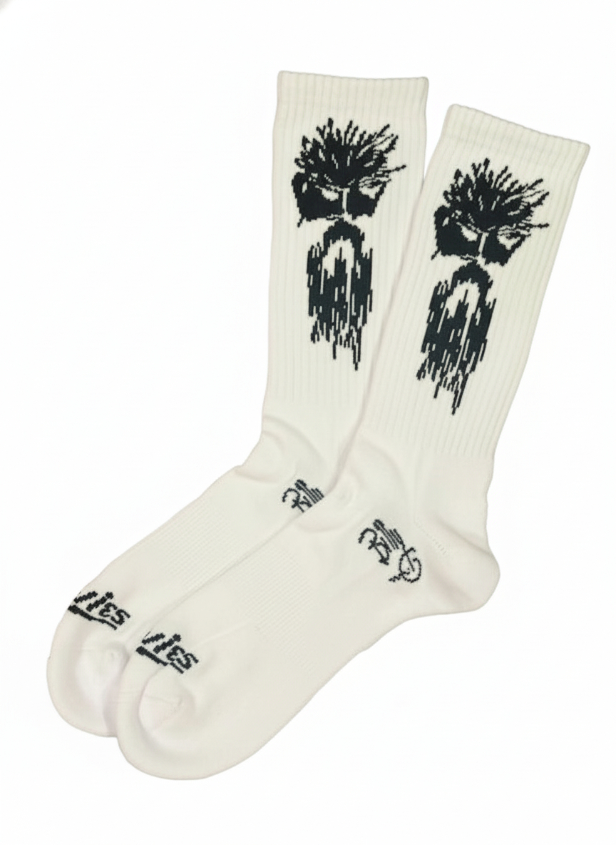 White boot socks with black tree-and-drip graphic, ribbed crew cuffs, pair shown.