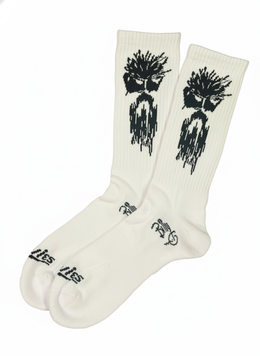 White boot socks with black tree-and-drip graphic, ribbed crew cuffs, pair shown.