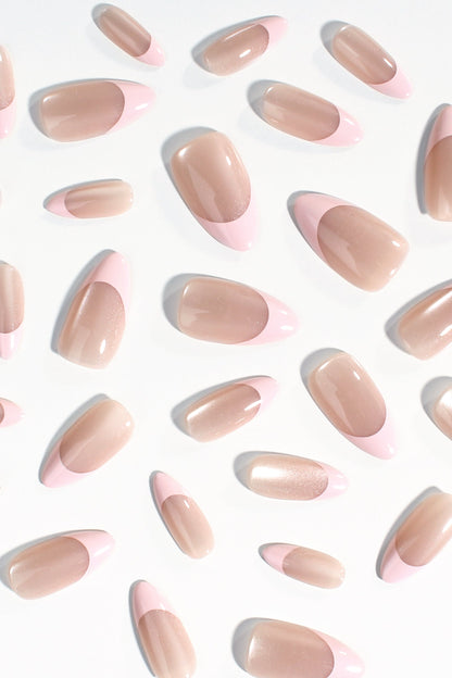 Assorted nude pink oval press-on nails with soft shine