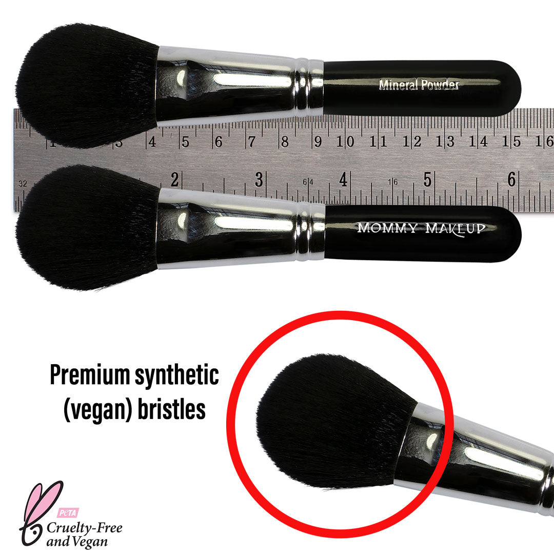 Mineral powder brush bristle end with soft black fibers and a chrome ferrule.