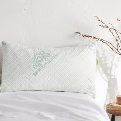 Adjustable cooling pillow with white cover and mint medallion logo at the center