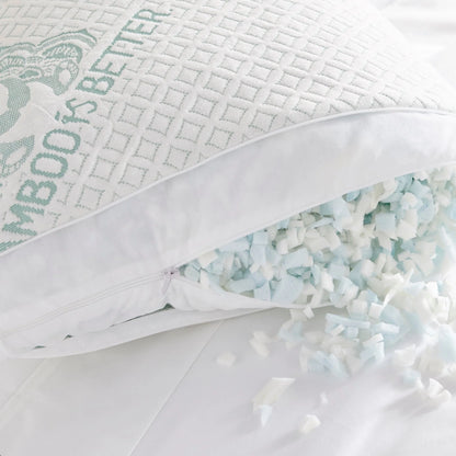 Adjustable cooling pillow with open zipper showing light mint shredded filling inside
