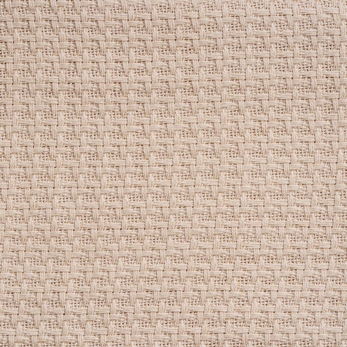 Beige basket-weave blanket fabric close-up texture