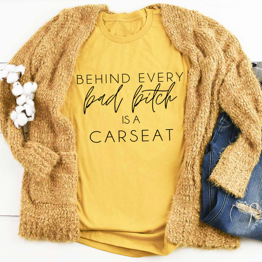 Behind Every Bad B Is A Car Seat T-Shirt - Renee Lane Company