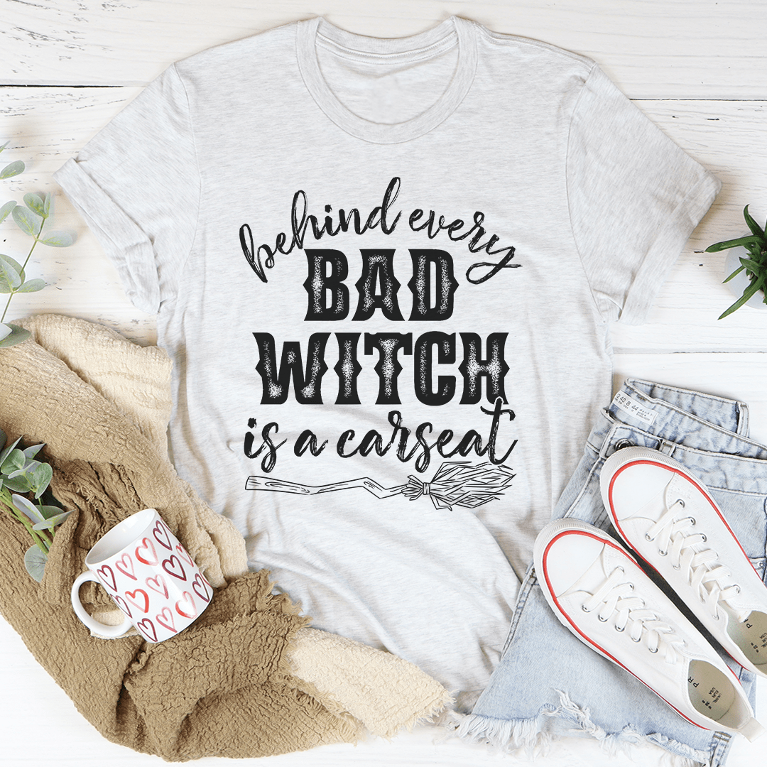 Behind Every Bad Witch Is A Car Seat T-Shirt - Renee Lane Company